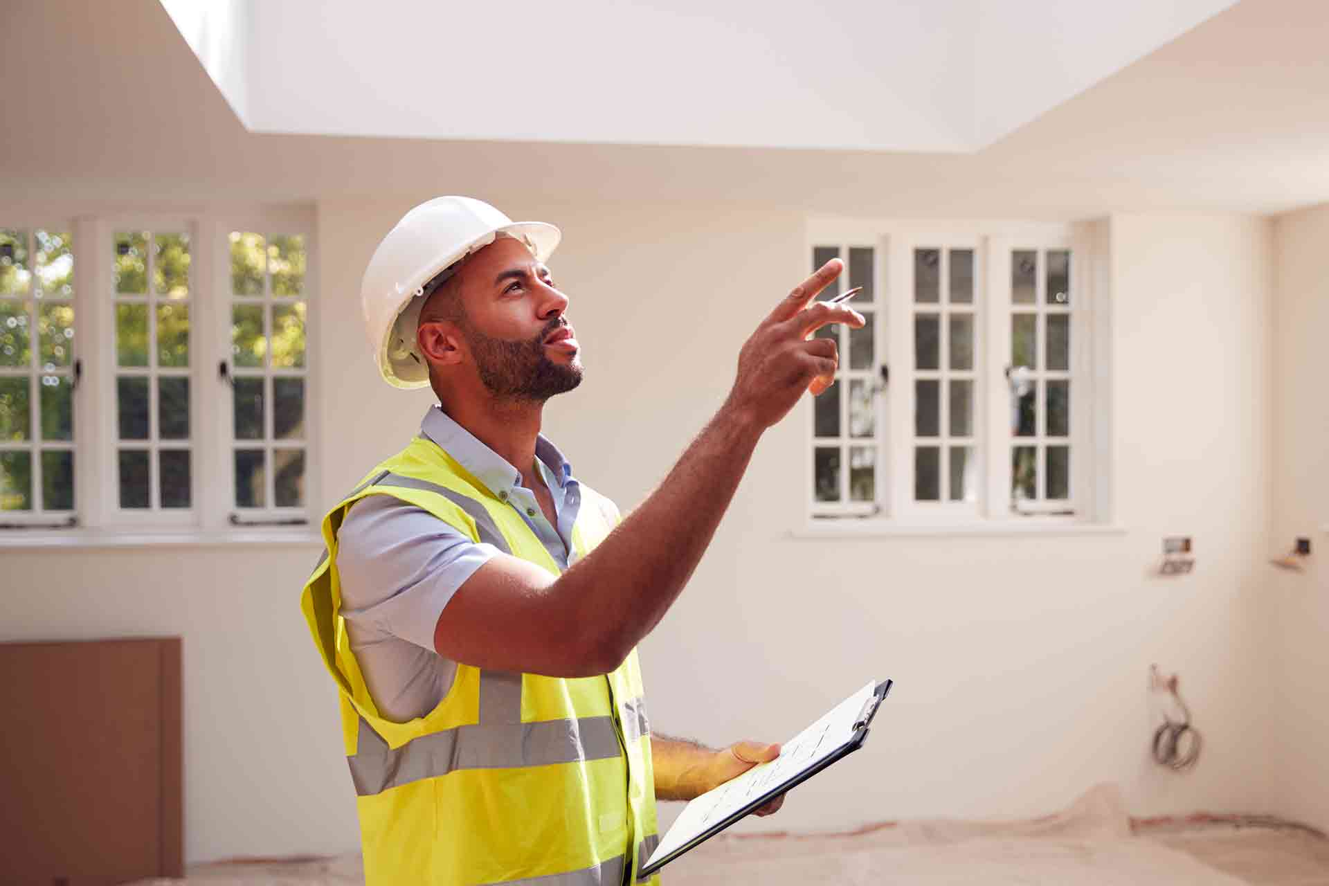 Third Party Wall Surveyors Kingswood & Fishponds reviewing plans between two parties during a dispute